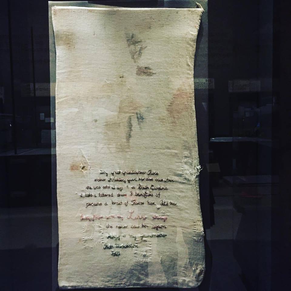 Embroidered in 1929 on this sack: "My great-grandmother Rose, mother of Ashley, gave her daughter this sack when she was sold at 9 in South Carolina. It held a tattered dress, three handfuls of pecans, a braid of Rose's hair. Told her 'It is filled with my love always.' They never saw each other again. Ashley told this to my grandmother Ruth Middleton." Photo by Kelly Crow.